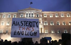 Greece_austerity_protest_sign_ap_img-1024x645